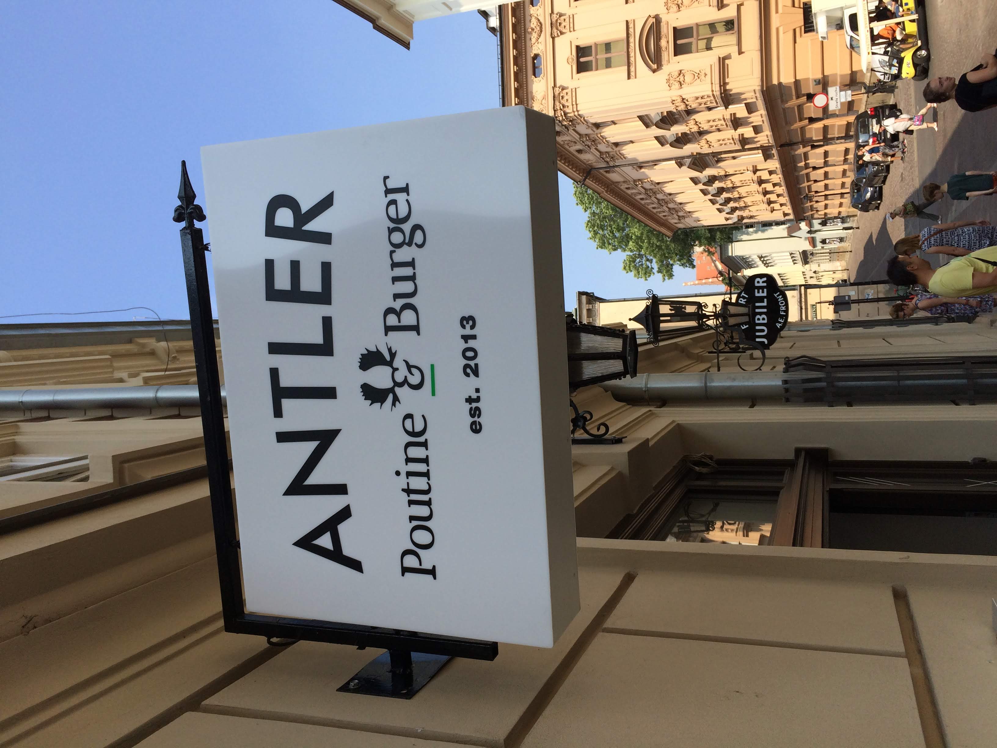 A poutine and a burger from Antler Poutine and Burger in Kraków